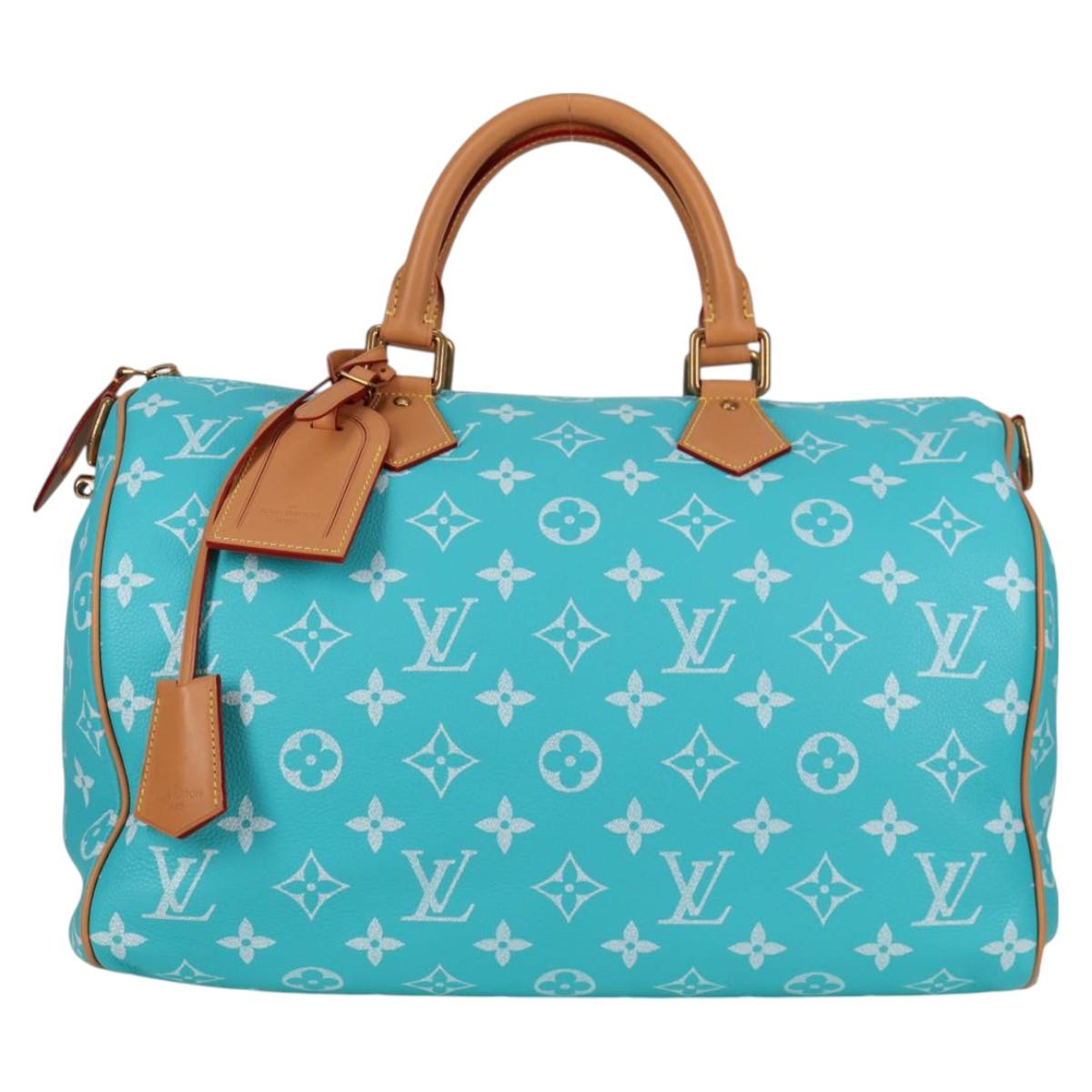 LOUIS VUITTON Speedy P9 Bandouliere 40 Bag Turquoise Blue M11563