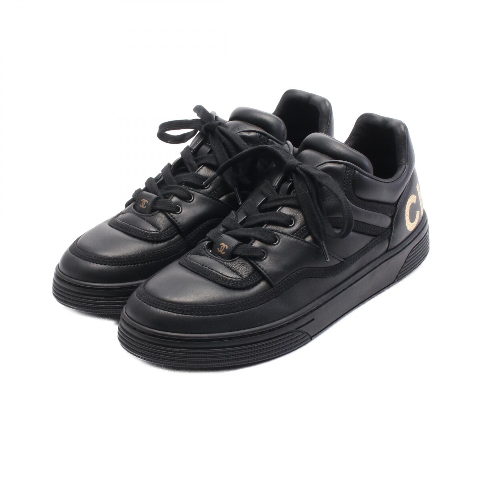 chanel sneakers gold black