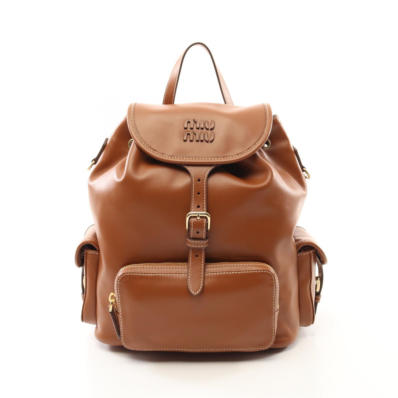 バックパック・リュック MIU MIU 5BZ042_2IBQ_F0TQF CANVAS AND LEATHER BACKPACK Red/brandy Canvas And Leather Backpack | Miu Miu