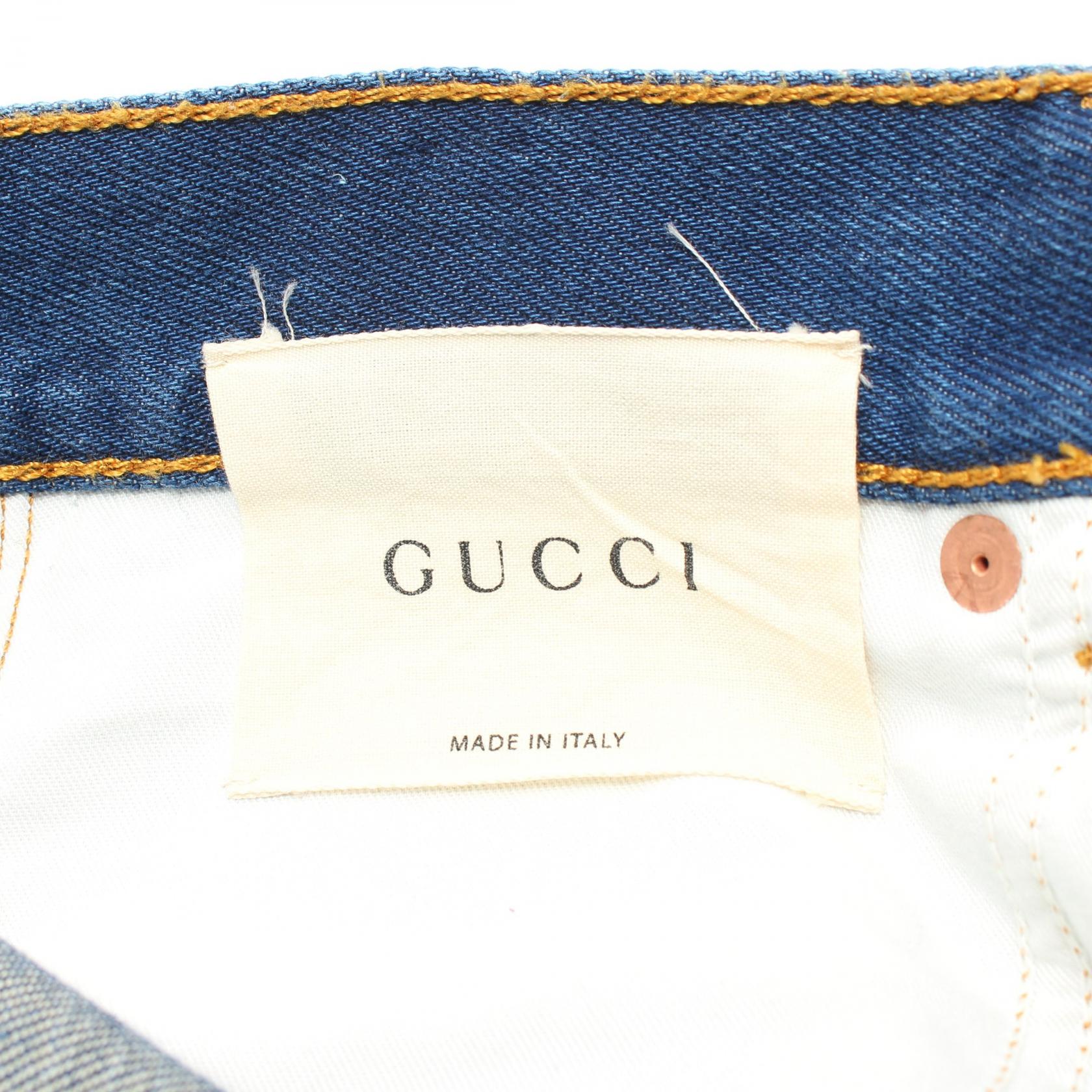 GUCCI EMBROIDERED FLOWER ROARING TIGER JEANS Denim pants