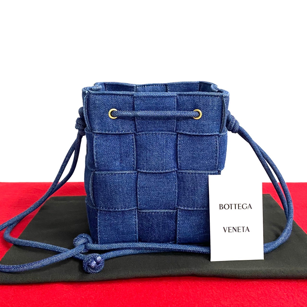 BOTTEGA VENETA Cassette mini intrecciato leather bucket bag